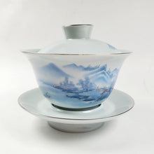 Load image into Gallery viewer, Gaiwan Porcelain Set - Gold Gilded Blue and White Mountain Theme
