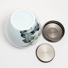 Load image into Gallery viewer, Bamboo Rock Garden Window Light Celadon Tea Jar sm

